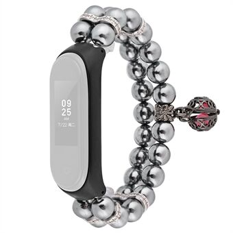 Til Xiaomi Mi Band 5/6 dobbeltrækker Faux Pearl Armbånd Håndledsrem Smart Watch Band med Metal Ball Decor